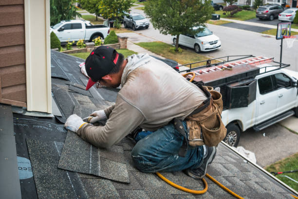 Professional Roofing technician working in Broomes Island, MD